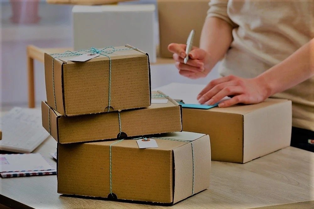 Packages being labeled for shipment